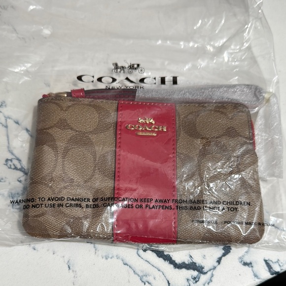 Coach Handbags - Coach Brown and Red Wristlet